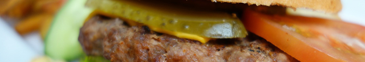 Eating American (New) Burger Sandwich at California Grill Nipomo restaurant in Nipomo, CA.